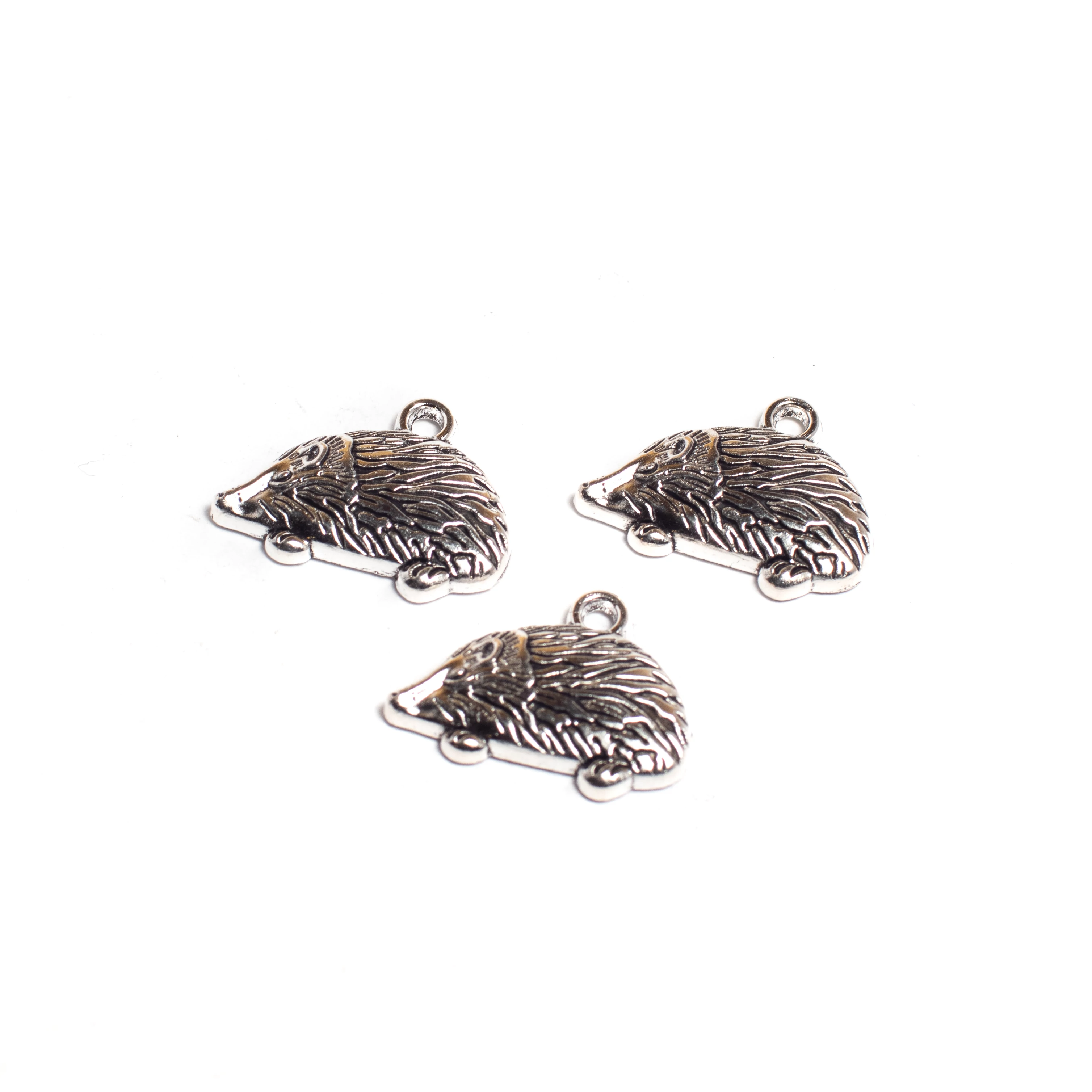 Sün, süni fityegő, medál, antik ezüst színű, 20x16 mm