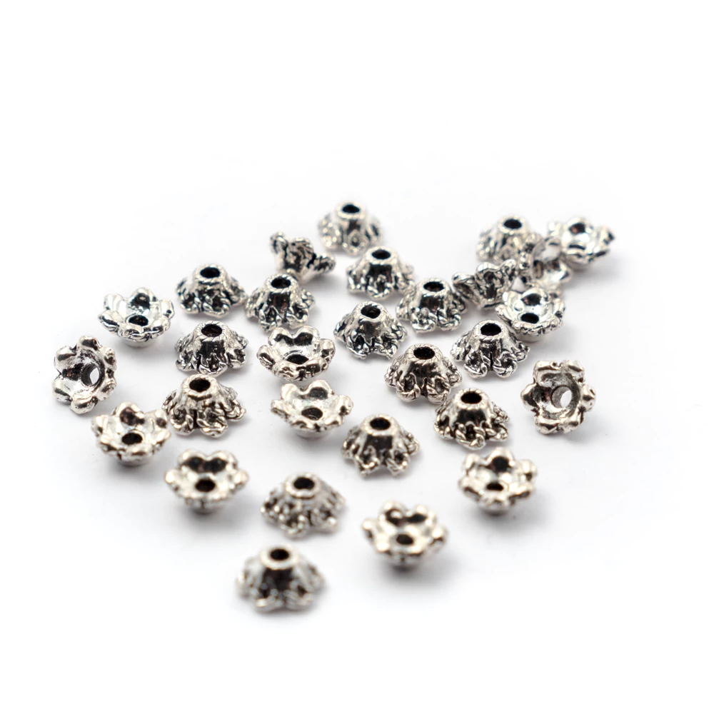 Kis hurkos gyöngykupak, antik ezüst színű, 6x3 mm, 10 db/cs