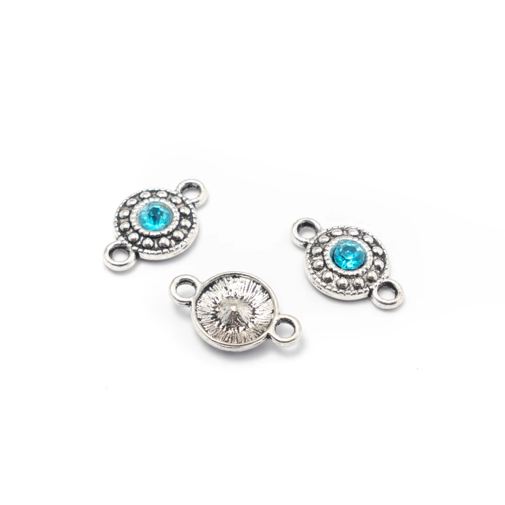 Világoskék strasszköves összekötő, antik ezüst színű, 18x11 mm