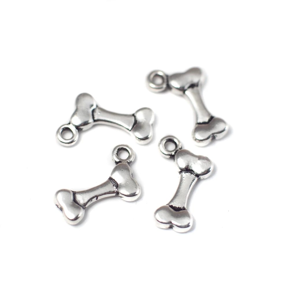 Csont fityegő, medál, antik ezüst színű, 17x10 mm