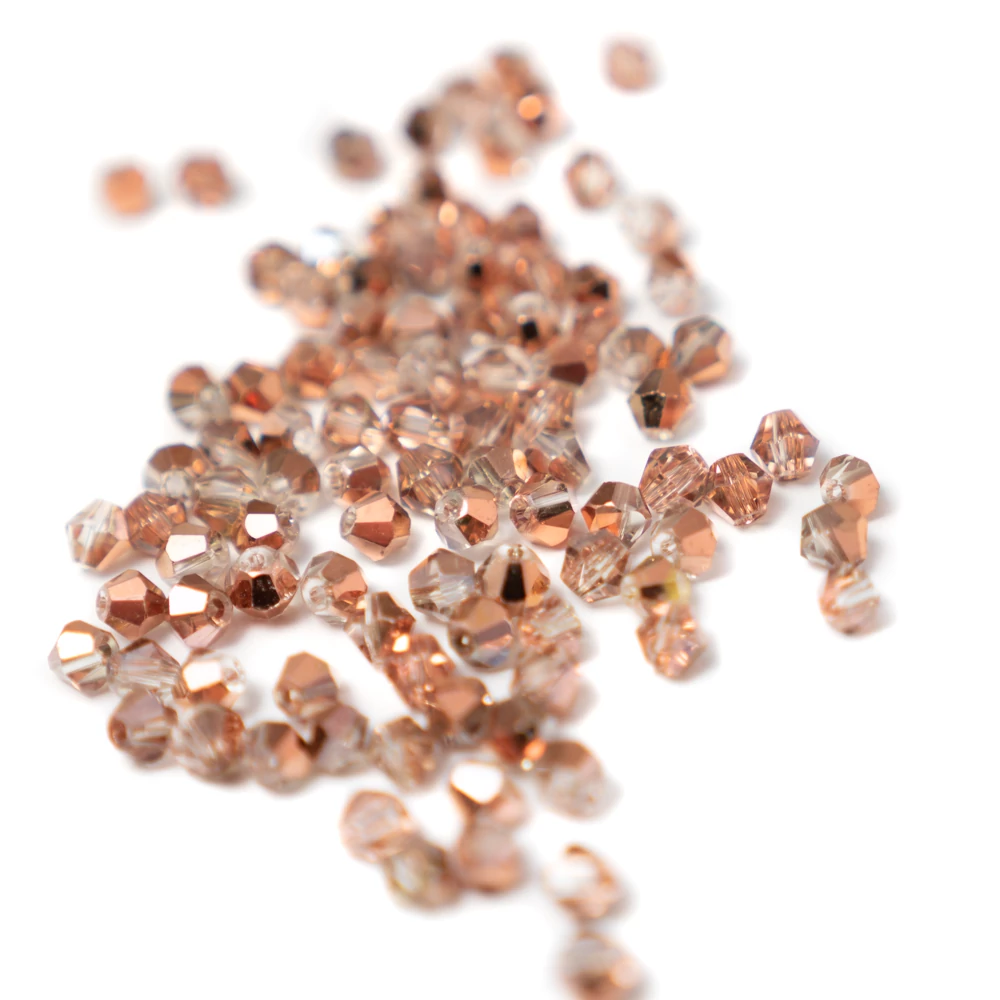 Metál réz színű csiszolt bicone üveg gyöngy, 4 mm