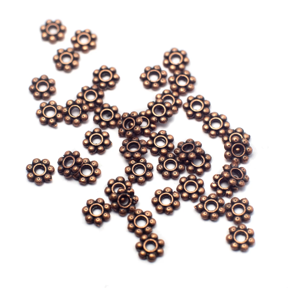 Kis virág köztes, vörösréz színű, 4 mm, 50 db/cs