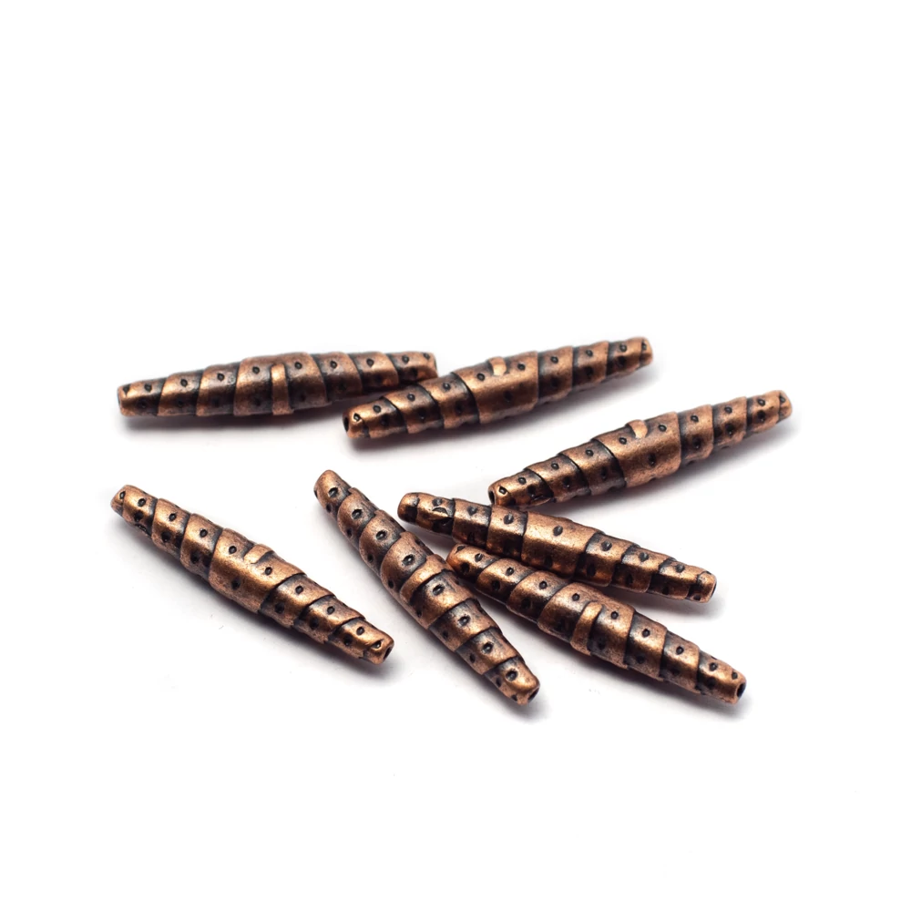 Csavart cső köztes, vörösréz színű, 25x5 mm