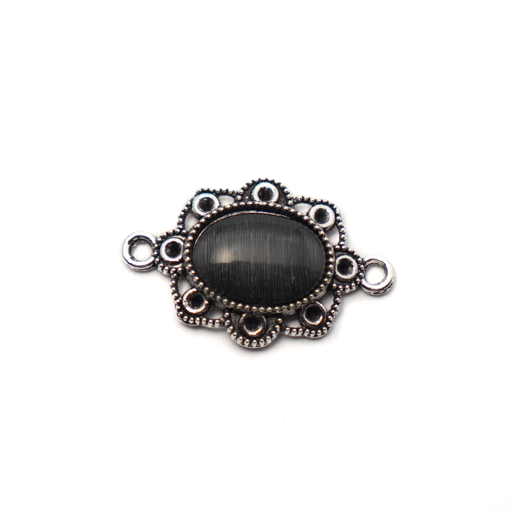 Ovális összekötő, fekete macskaszem kabosonnal, antik ezüst színű, 29x18 mm