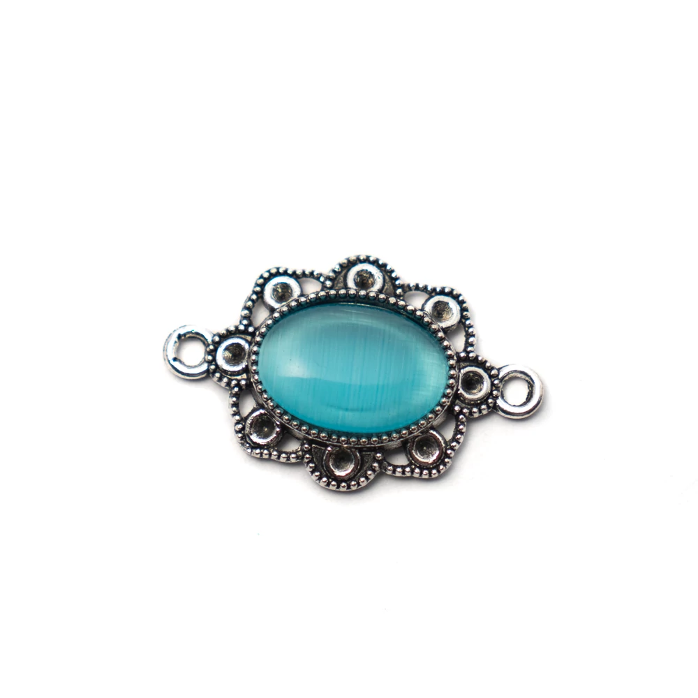 Ovális összekötő, kék macskaszem kabosonnal, antik ezüst színű, 29x18 mm