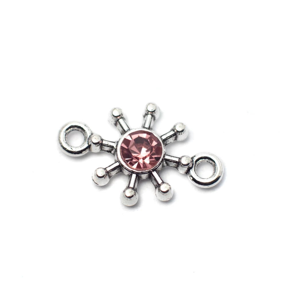 Összekötő rózsaszín strasszkővel, antik ezüst színű, 21x13 mm