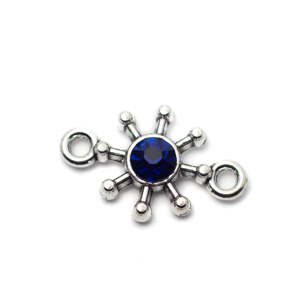 Összekötő sötétkék strasszkővel, antik ezüst színű, 21x13 mm