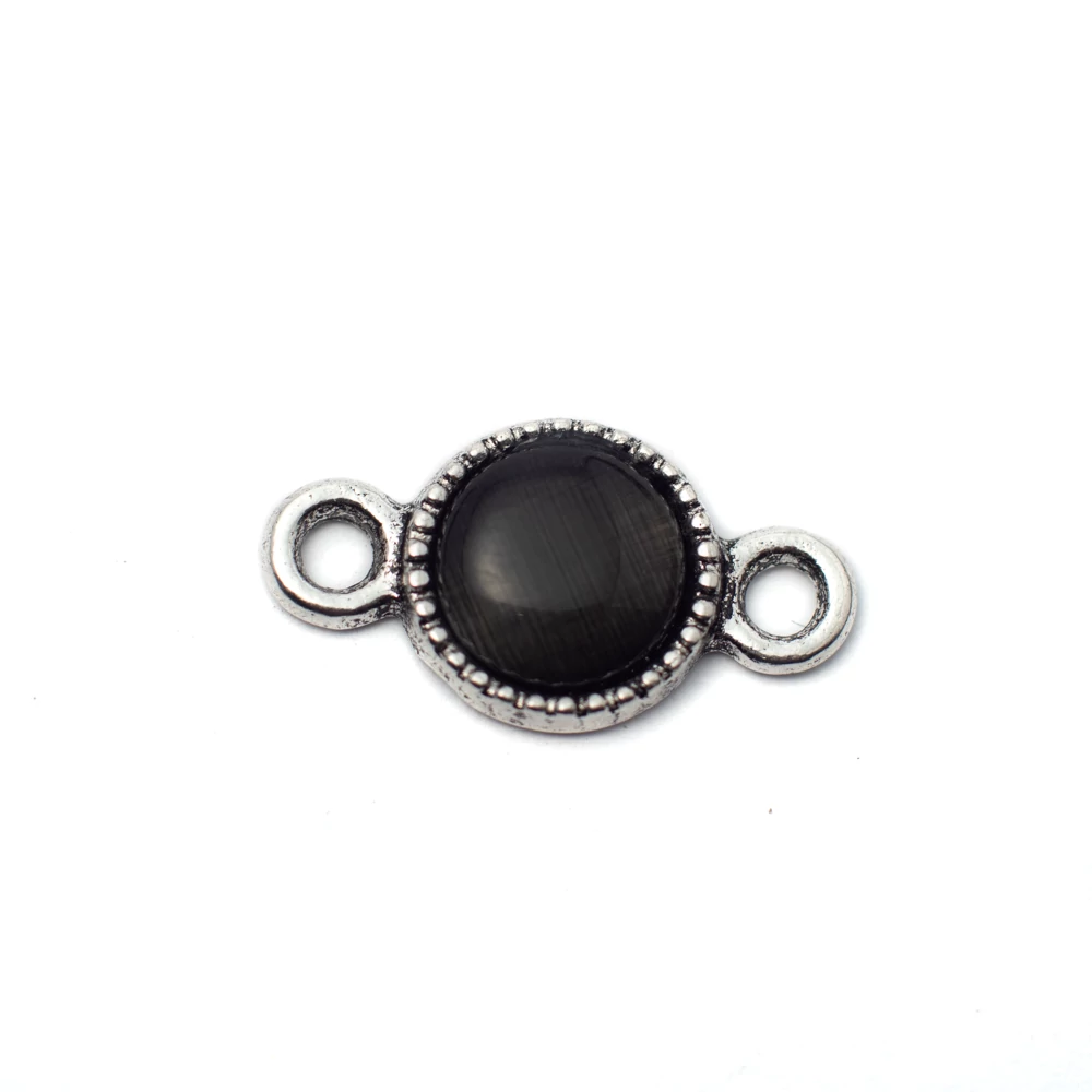 Összekötő fekete macskaszem kabosonnal, antik ezüst színű, 18x10 mm