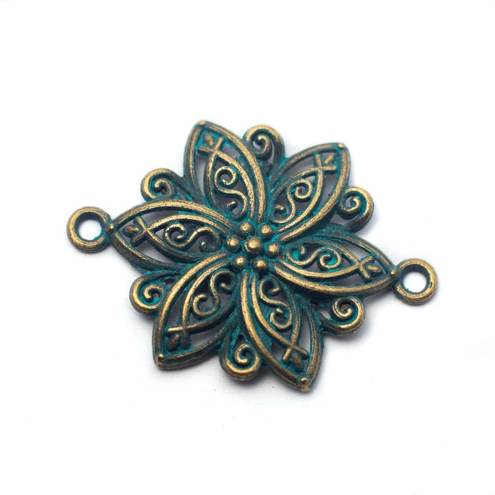 Virág összekötő, patina bronz színű, 40x28 mm