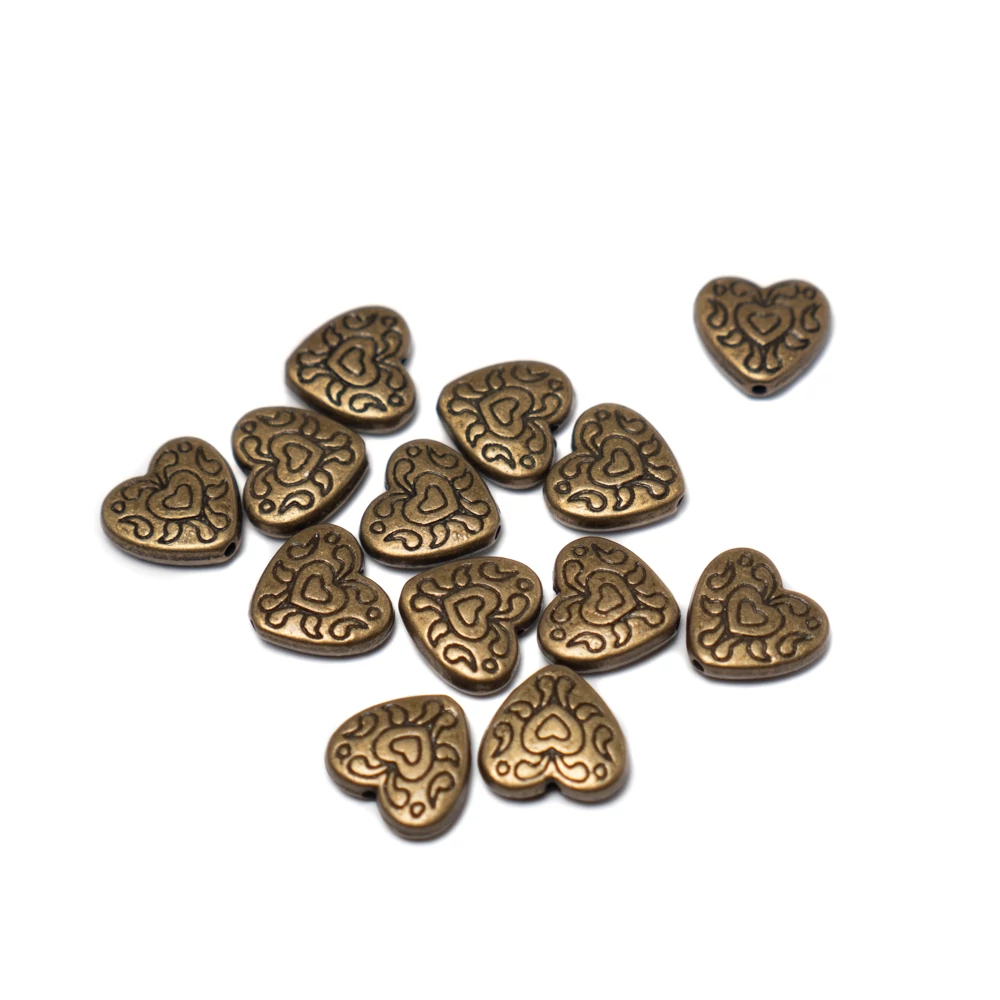 Mintás szív köztes, antik bronz színű, 11x11 mm