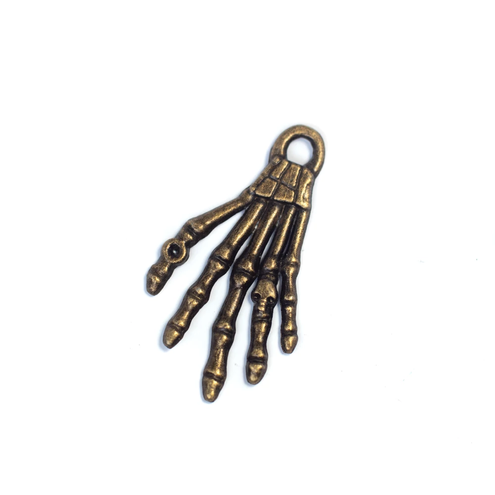 Csont kéz fityegő, medál, antik bronz színű, 35x20 mm