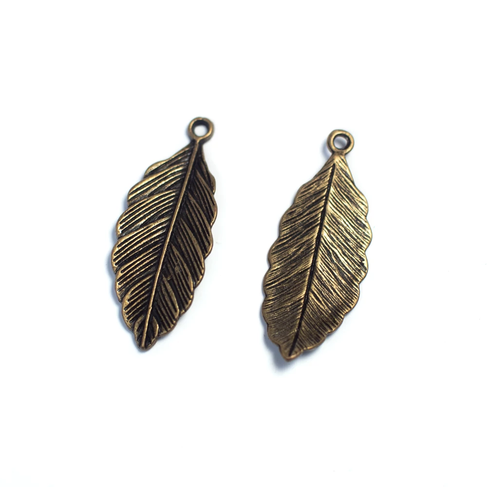 Levél fityegő, medál, antik bronz színű, 31x13 mm