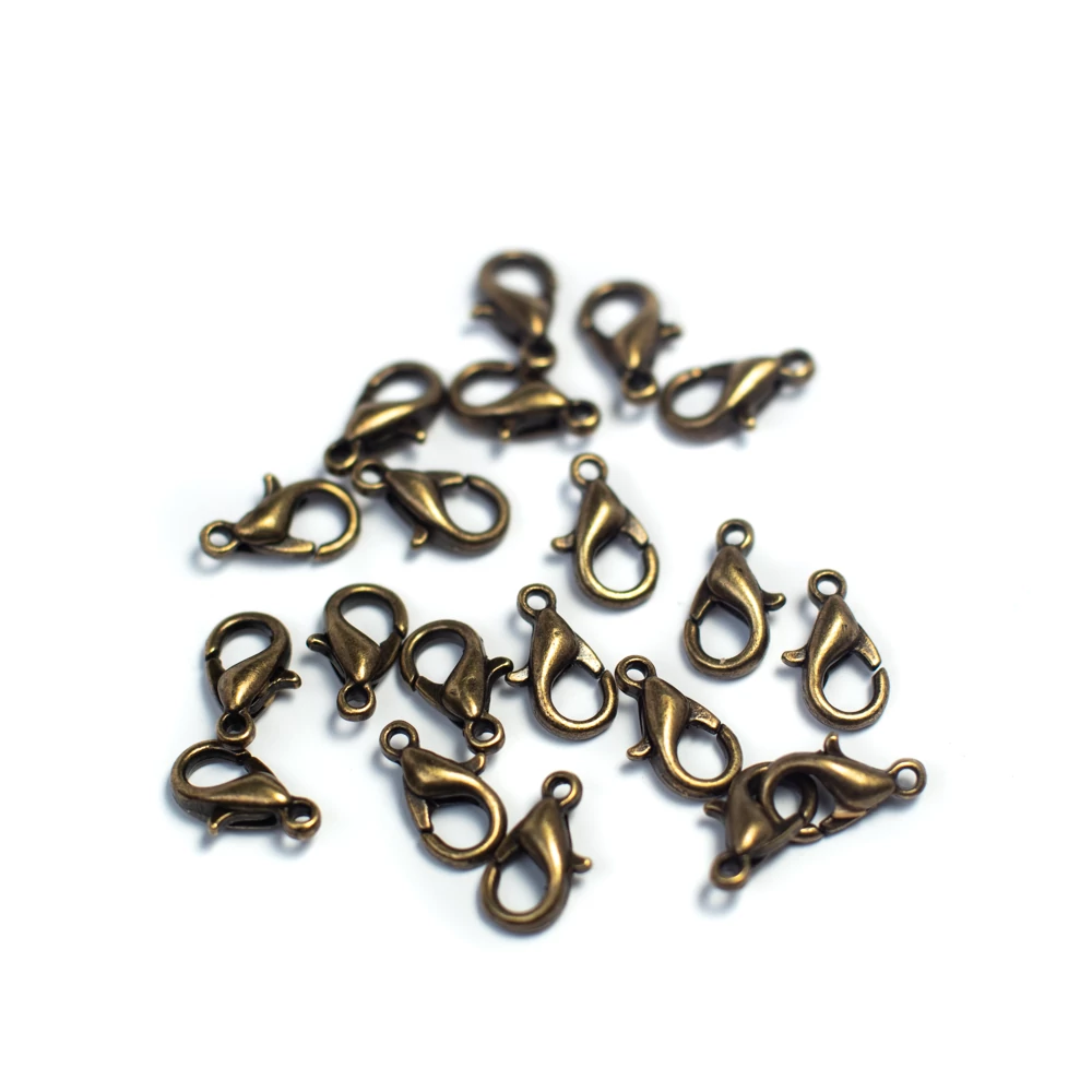 Delfinkapocs, antik bronz színű, 12x8 mm