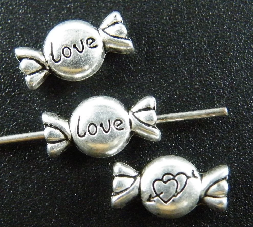 Cukorka köztes, antik ezüst színű, 11x6 mm