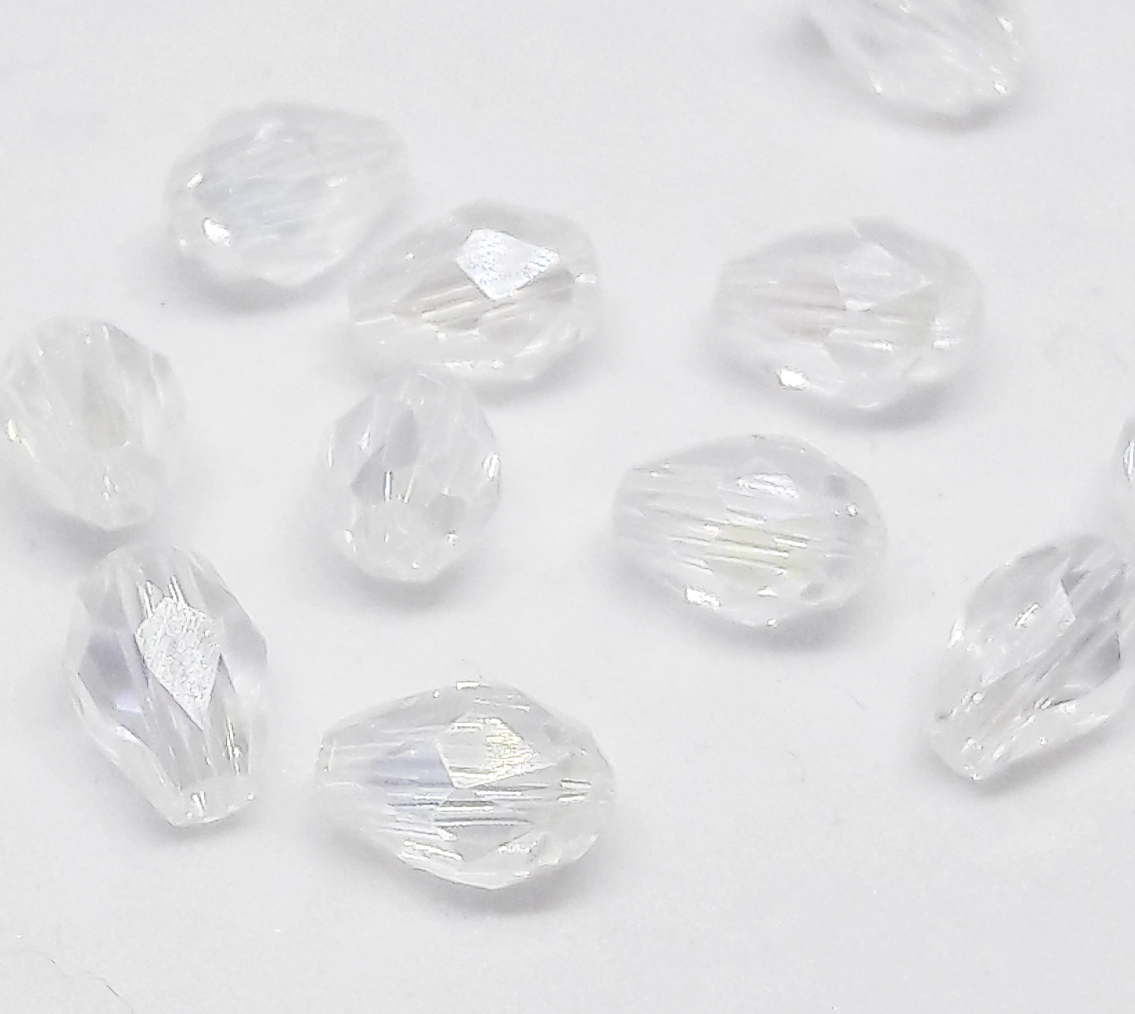 Kristály AB csiszolt csepp üveg gyöngy, 6x4 mm