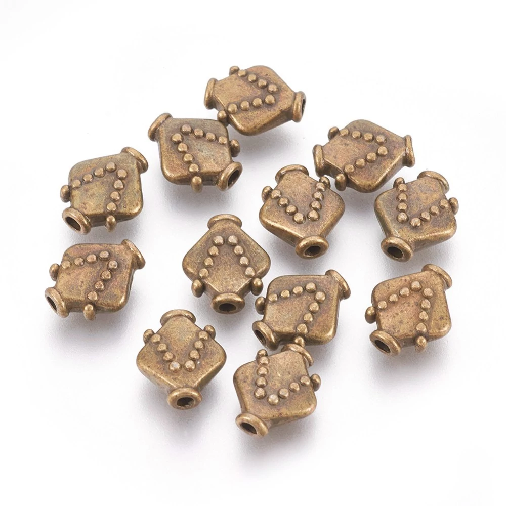 Mintás köztes, antik bronz színű, 10x9 mm