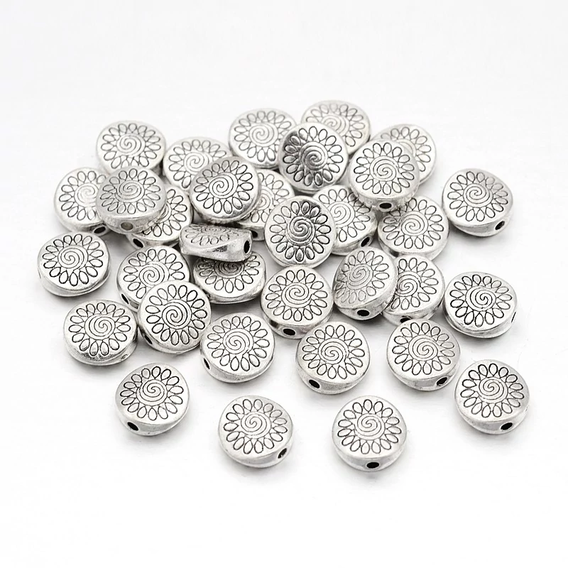 Virágos lapos korong köztes gyöngy, antik ezüst színű, 8x3 mm