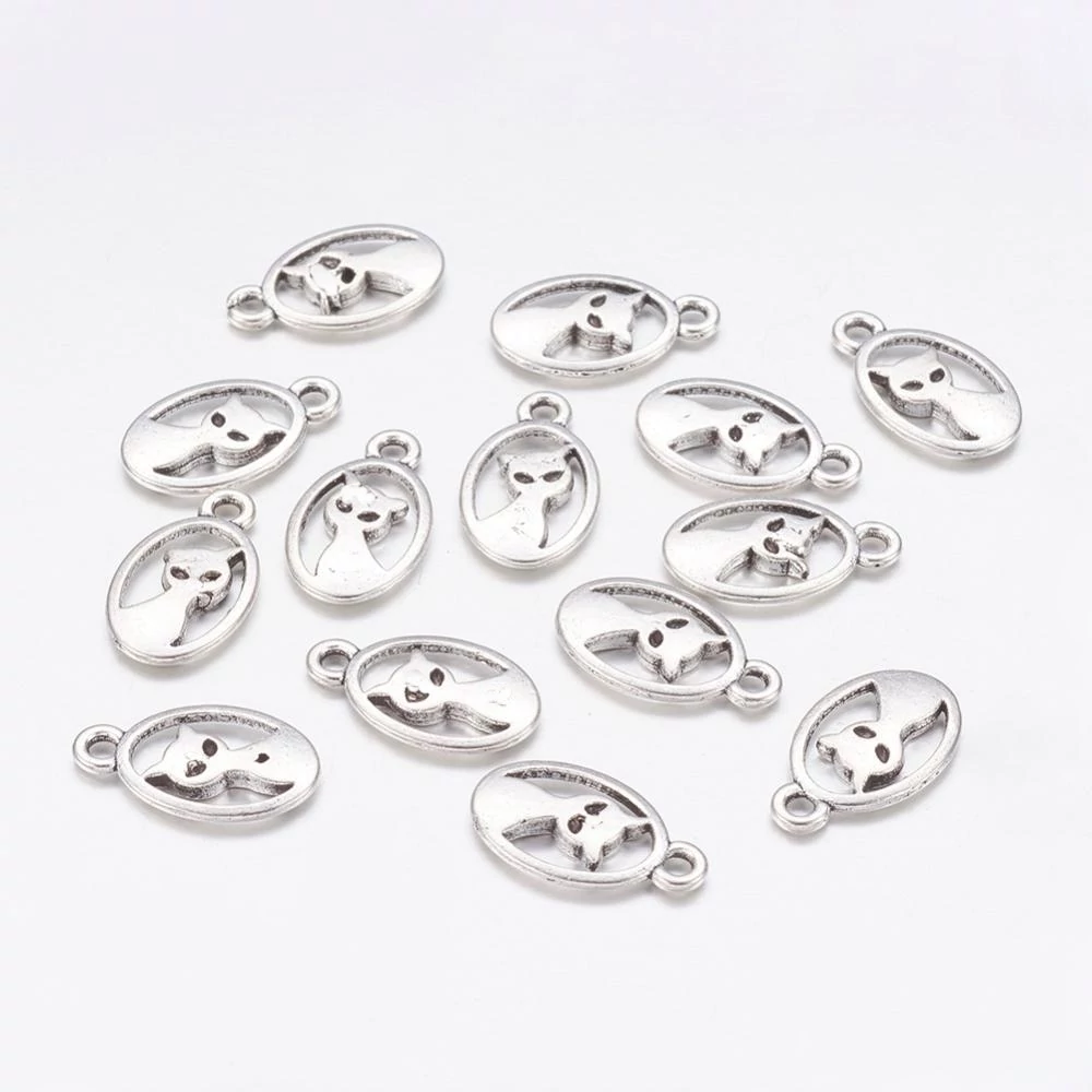 Cica fityegő, medál, antik ezüst színű, 16x9 mm