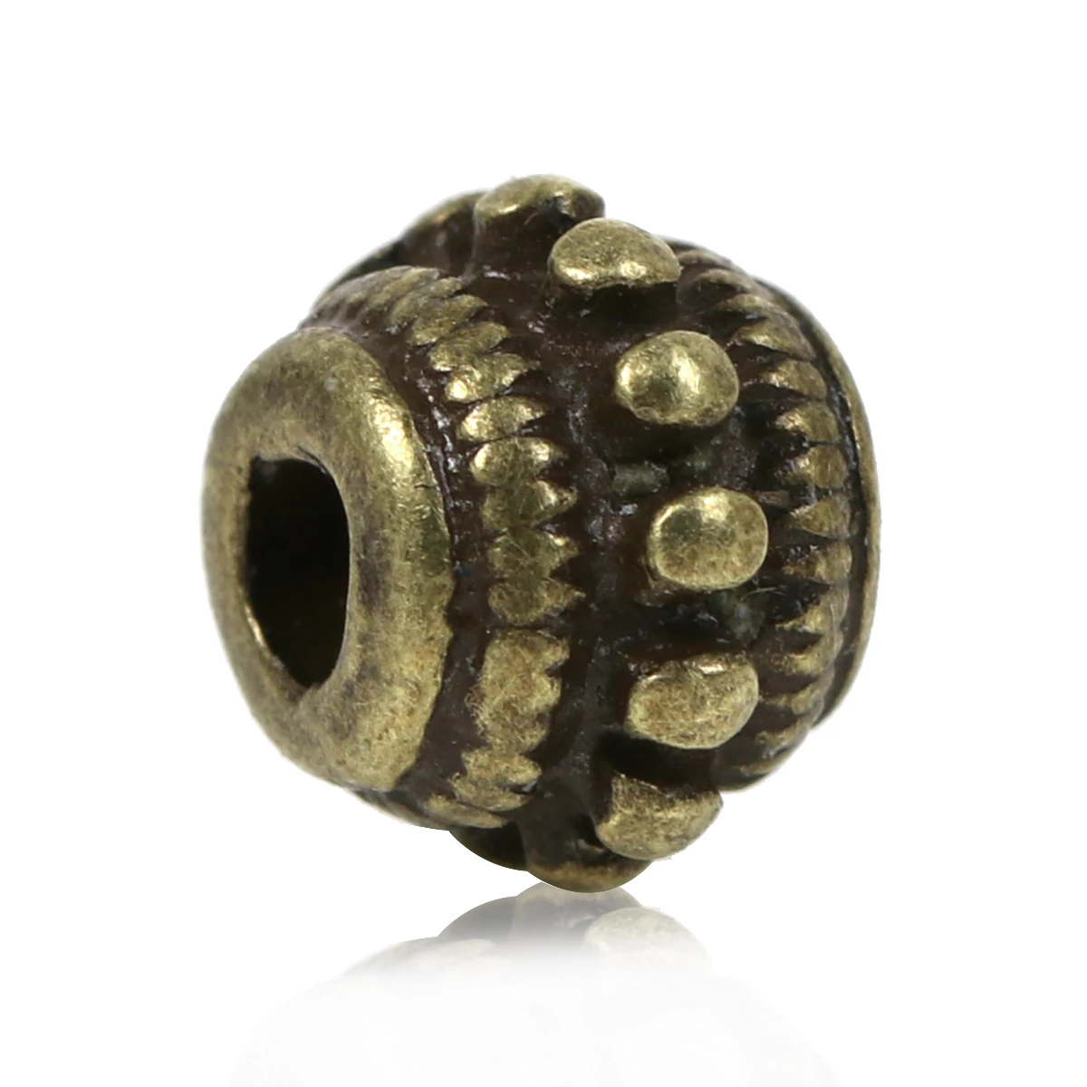 Pöttyös köztes, antik bronz színű, 8x6 mm