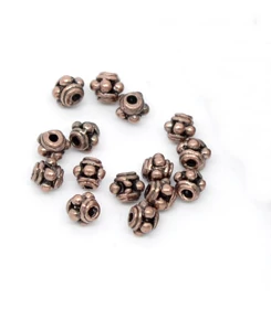 Pöttyös köztes gyöngy, vörösréz színű, 4 mm, 50 db/cs