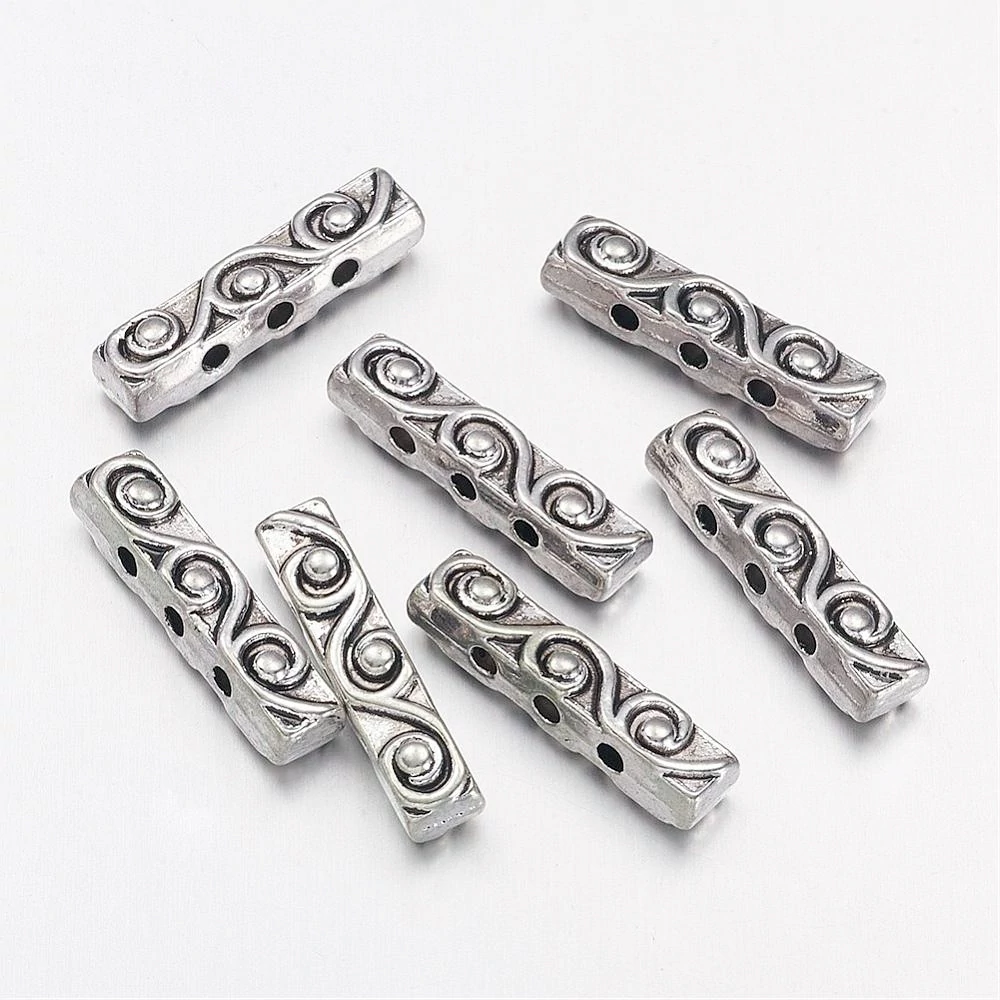 Mintás távtartó, antik ezüst színű, 18x4 mm