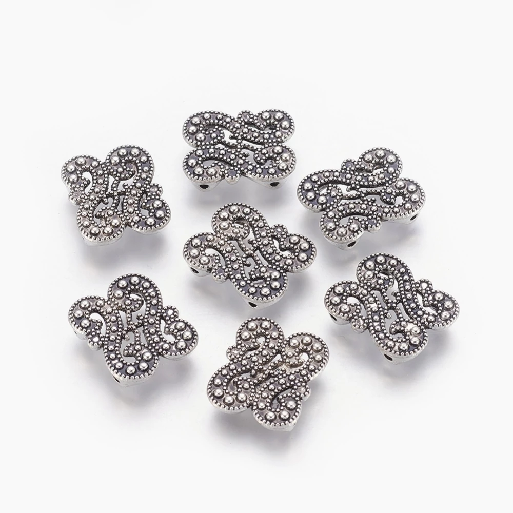 Díszes távtartó, antik ezüst színű, 18x15 mm