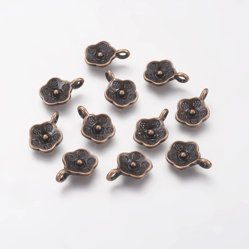 Kis virág fityegő, medál, vörösréz színű, 14x10 mm