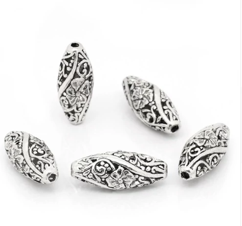 Áttört virágos köztes, antik ezüst színű, 26x10 mm