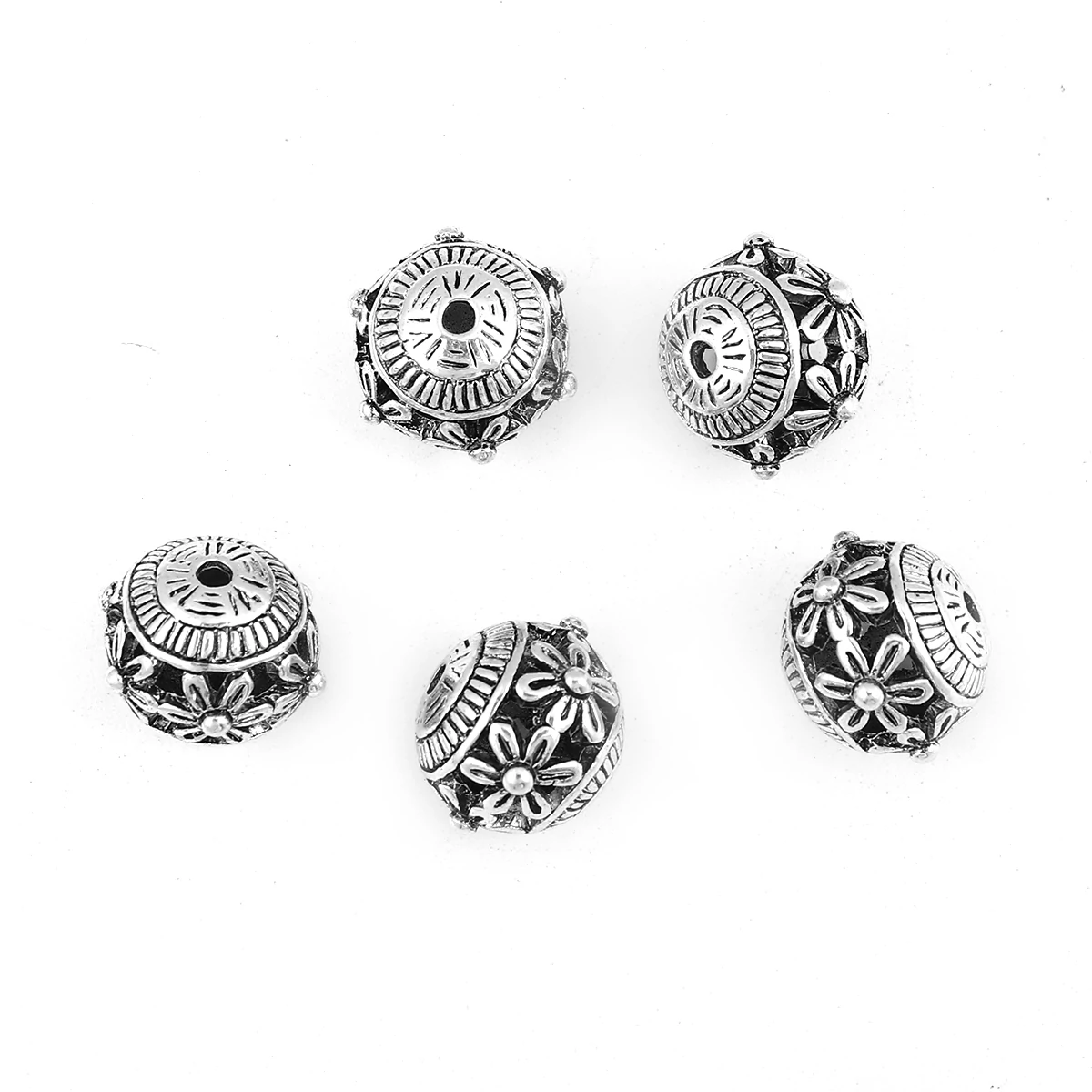 Áttört, virág mintás köztes, antik ezüst színű, 16 mm